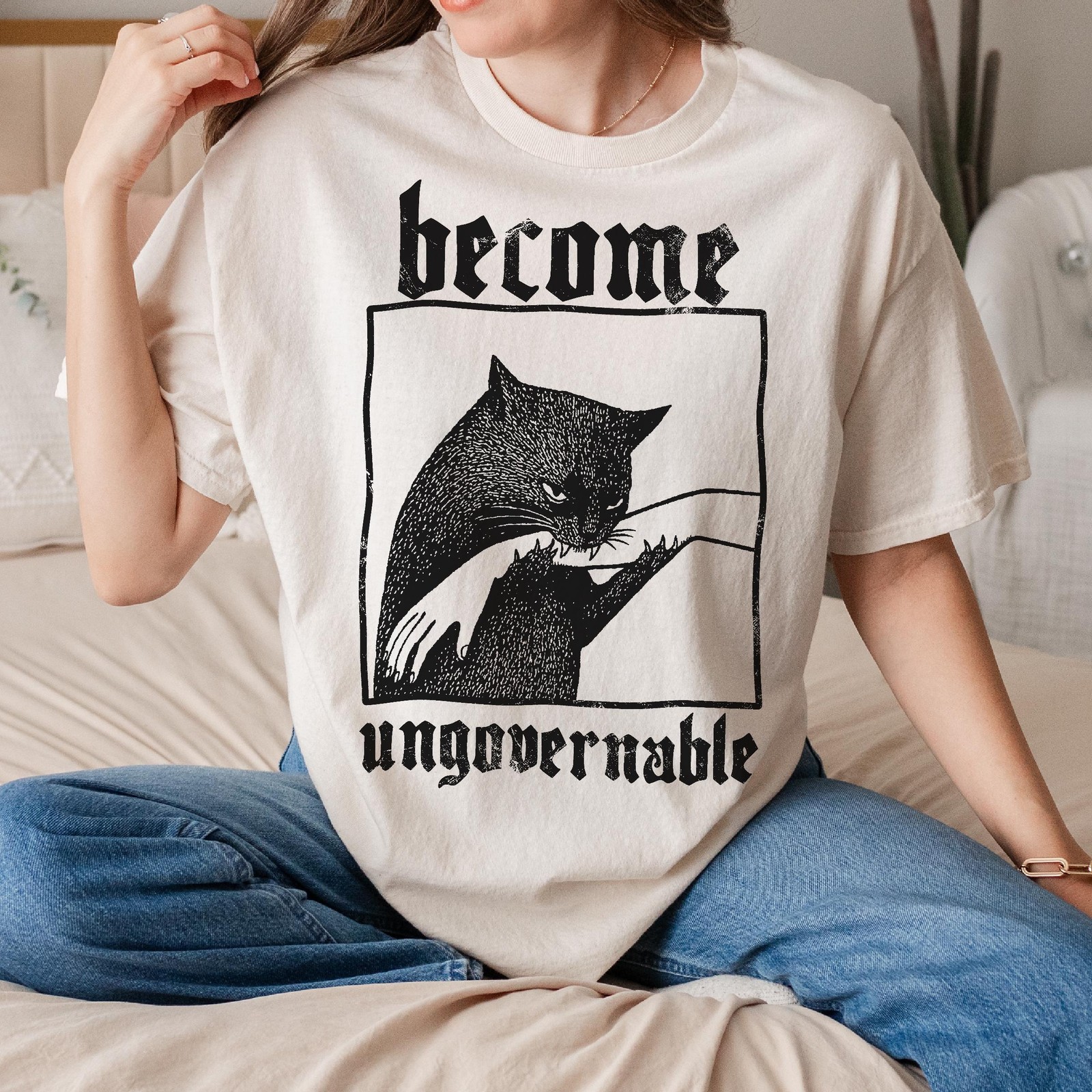 Become Ungovernable Cat Biting Hand Funny Graphic T-Shirt Unisex