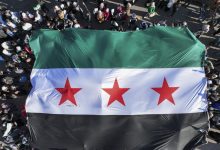 "علم الثورة السورية" / AP