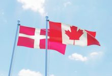 العلمين الكندي والدنماركي / Gettyimages.ru